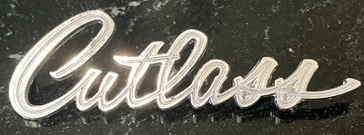 Oldsmobile Cutlass 1969 original vintage emblema de escritura cromado PT# 8727372 Foto 1 de 4