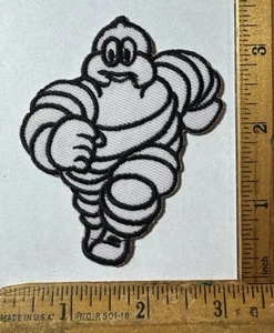 Parche bordado con logotipo de Michelin Man Tire Company hierro carreras de autos - Imagen 1 de 2