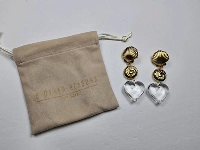 Pendientes sirena acrílico tono oro 8 razones Foto 1 de 3