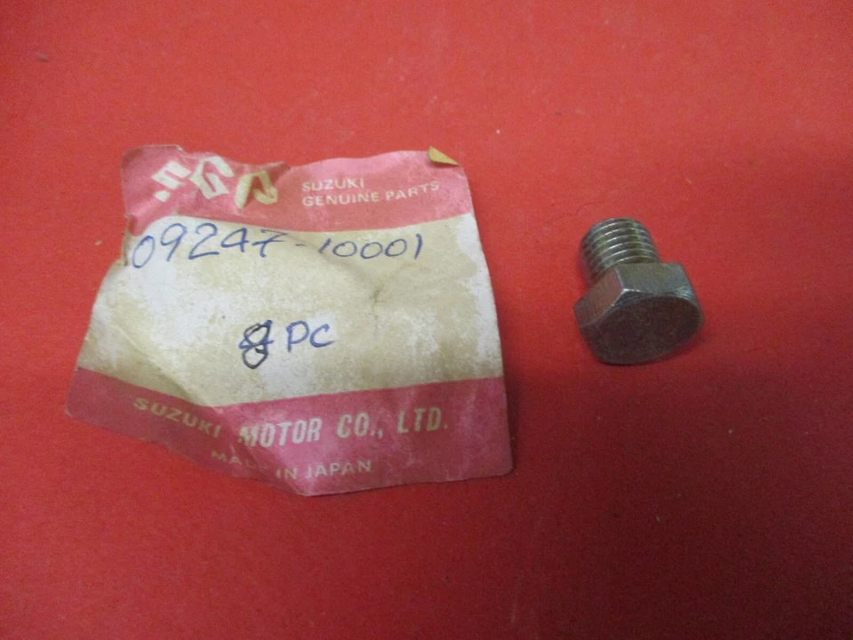 NUEVO DE LOTE ORIGINAL SUZUKI RV90 JR50 RV125 T350 TS400 ENCHUFE 09247-10001 Foto 1 de 1