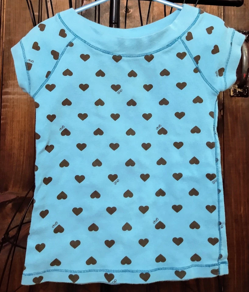 Camisa de diseño turquesa con corazones marrones GAP para niñas talla S (6/7) Foto 1 de 1