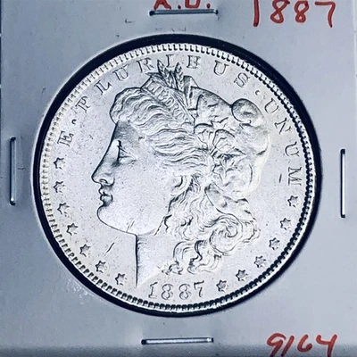 Dólar de plata Morgan 1887 alta calidad genuino EE. UU. COMO NUEVO MONEDA RARA 9164 Foto 1 de 3