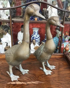 A pair of antique Indian? brass geese. chisel carved. 13.5” and 12” tall.  - Picture 1 of 12
