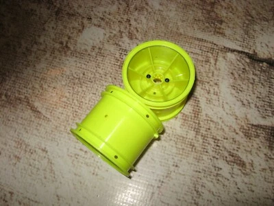 Vintage RC Losi XXT Series 2.2" Front Disc Wheels Plastic Yellow (2) 7077 - Image 1 of 2