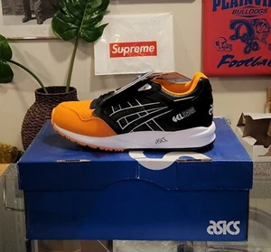 ASICS H5V4Y-3090 Gel-Saga Herren Turnschuhe Freizeit - schwarz, orange - Bild 1 von 3