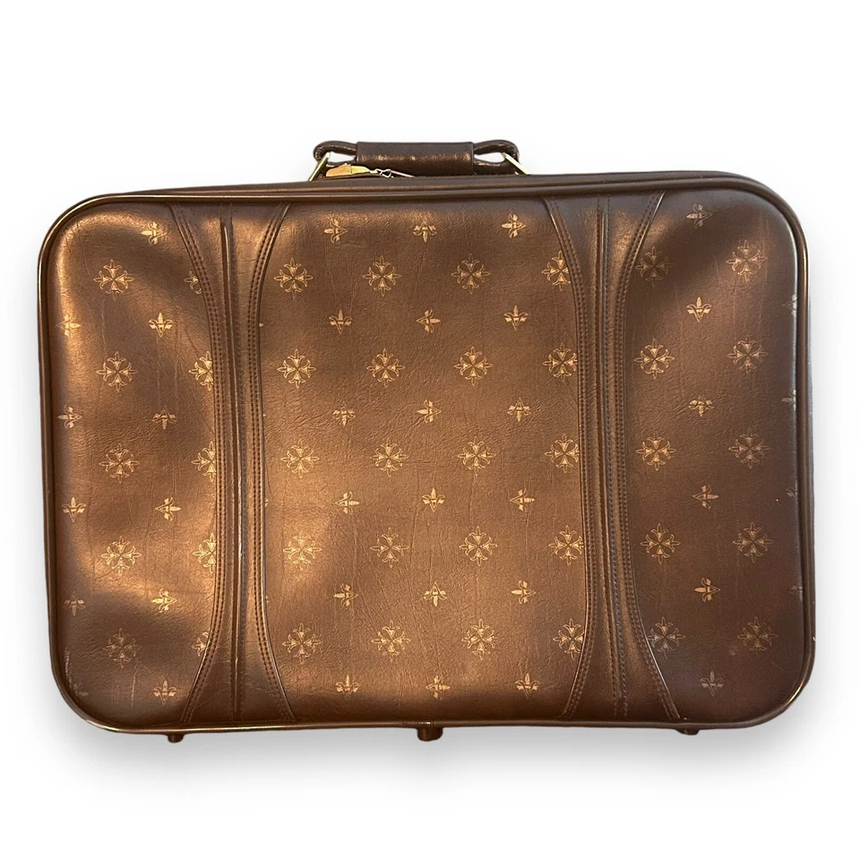 Maleta de colección marrón American Tourister 1974 estampado flor de lis dorado Foto 1 de 4