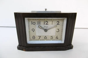 REVEIL ART DECO EN BAKELITE - A REVISER - SONNERIE FONCTIONNE - Imagen 1 de 8