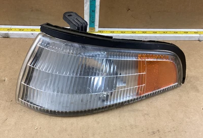 1991-1992 Mercury Tracer Left Driver Corner/Park Turn Signal Light 2BE936916 - Image 1 of 4