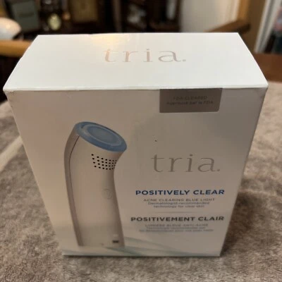 Claro positivo para limpiar el acné luz azul Tría Foto 1 de 4