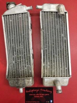 Juego de radiadores Suzuki RMZ250 2006 radiadores doblados usados Foto 1 de 4