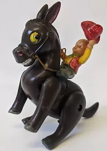 Vintage 1940's (Masudaya, Japan) CELLULOID Wind-up BUCKING DONKEY w/ Rider - Picture 1 of 3