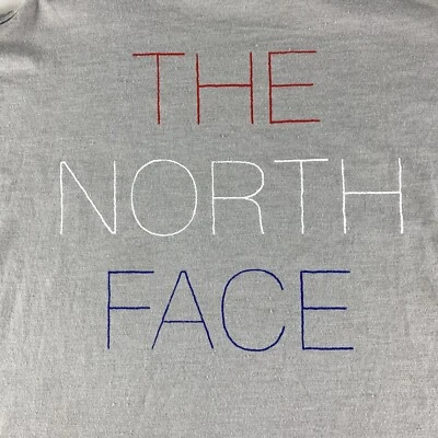 Camiseta sin mangas The North Face para mujer pequeña gris gimnasio para correr rojo blanco azul gráfico Foto 1 de 4