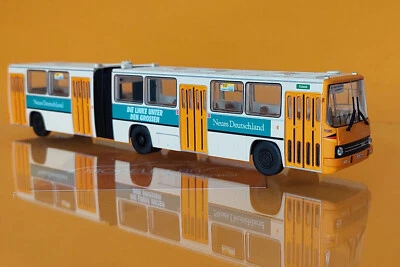 Brekina 59732 # Ikarus 280 .02 BVG Berlin - Neues Deutschland 1990 1:87 Bus - Bild 1 von 3