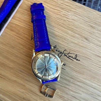 Universal Geneve, Polerouter Date, chapado en oro, caja de 35 mm, esfera dorada Guilloche Foto 1 de 4