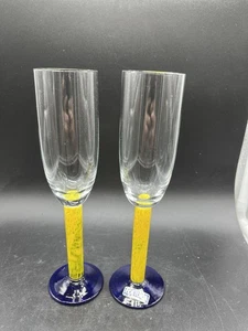 Vintage FOSTORIA (2) Flute Stemware Yellow Art Glass Stem Blue Foot - Picture 1 of 8