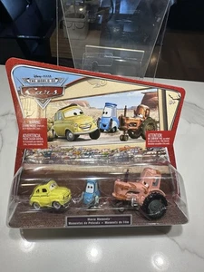 Disney Pixar Word of CARS Movie Moments LUIGI GUIDO & TRACTOR International Card - Picture 1 of 2