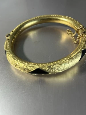 Wear Art: brazalete de oro de 22kt  Foto 1 de 4