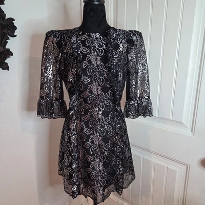 Vestido The Vampire’s Wife x H&M Mediano Negro Plata Volantes Encaje Transparente Atado Trasero  Foto 1 de 4