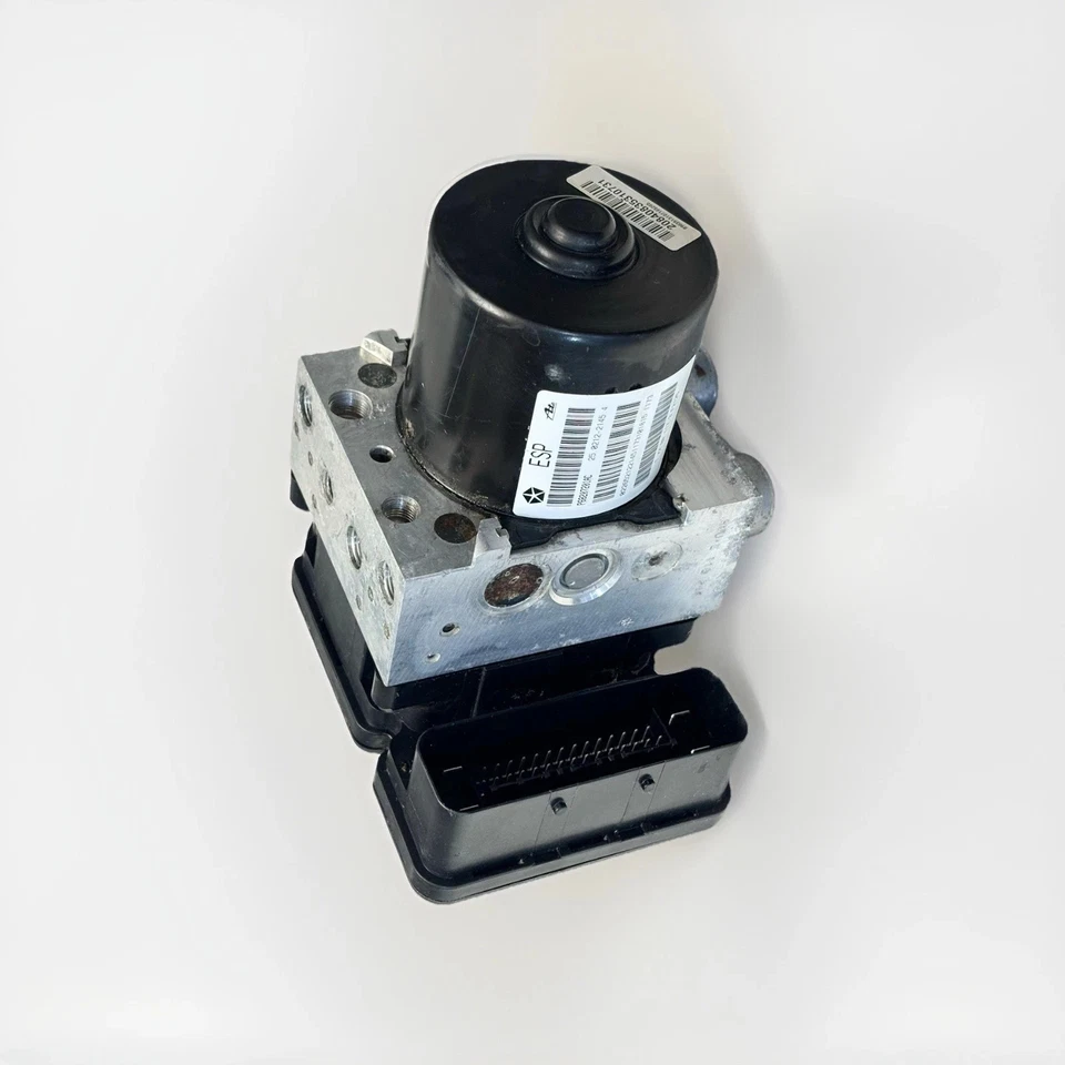Bomba módulo freno antibloqueo Dodge RAM 1500 ABS 2013 P68207201AC OEM Foto 1 de 4