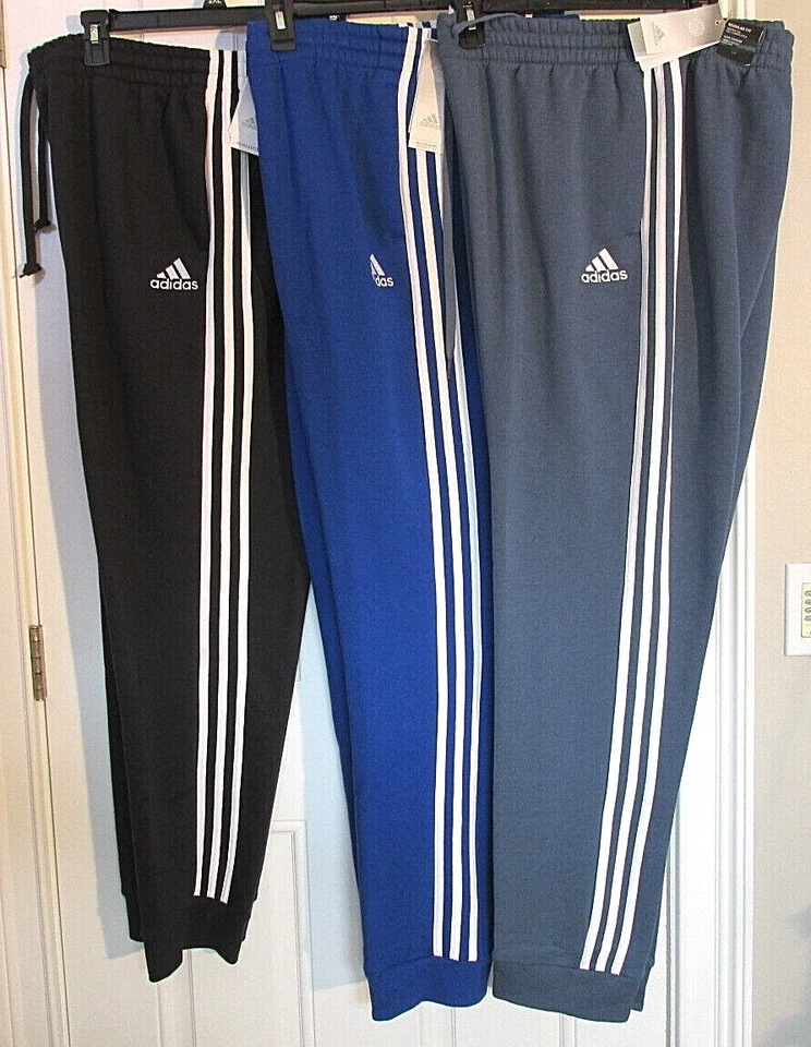PANTALONES DE CHÁNDAL PARA HOMBRE ADIDAS ESSENTIALS 3 RAYAS FORRADOS DE LANA VER TALLAS Y COLORES Foto 1 de 1