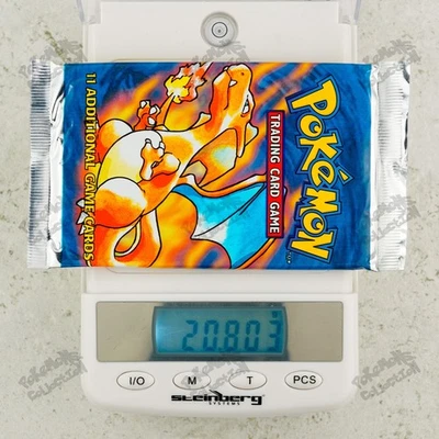 20.803g Charizard art! Pokemon Base Set Booster Pack TCG 4th print UK 1999-2000 - Image 1 of 4