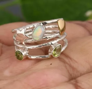 Silver spiral ring with Ethiopian opal and peridot gemstone heart and star ring - Picture 1 of 7