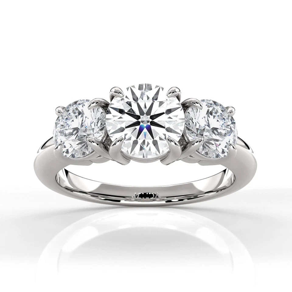 Anillo de compromiso de diamantes de corte redondo con montura de puntas de canasta de 3 piedras GIA E SI1 3,46 quilates Foto 1 de 4