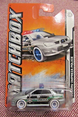 MATCHBOX 2012 MBX ARTIC SUBARU IMPREZA POLICE #78 SILVER - Image 1 of 4