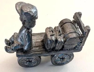Pewter figure of small boy riding a railroad baggage cart - MINT - Picture 1 of 1
