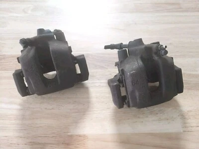 97-06 BMW E46 E36 E85 Z3 Z4 JUEGO DE PARES DE PINZAS DE FRENO DELANTERAS DERECHA E IZQUIERDA OEM Foto 1 de 4