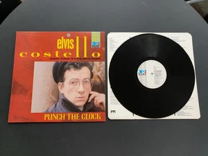 ELVIS COSTELLO - PUNCH THE CLOCK 1983 UK PRESS 12" VINYL RECORD LP EX - Picture 1 of 5