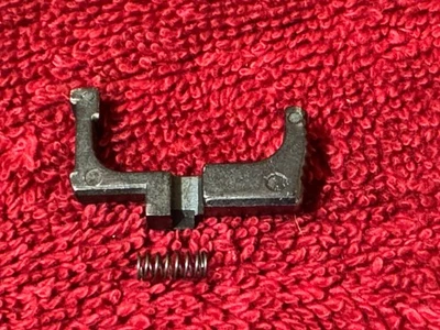 Bryco Jennings Nine 9mm Magazine Release Catch Latch & Spring- 31803 - Image 1 of 2