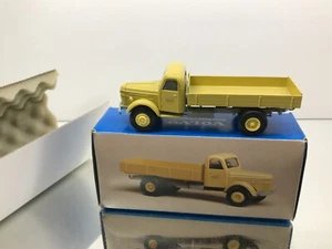 CONRAD 280878 VOLVO 1947 WITH TIPPING REAR KIPPER -YELLOW 1:43- GOOD IN BOX - Picture 1 of 9