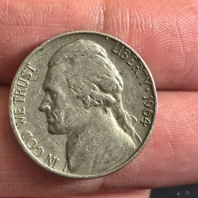 Rare 1964 Mint error Jefferson Nickel W/Rim Errors On The Obverse and Reverse.. - Image 1 of 2