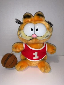 Vintage Stofftier Garfield mit rotem # 1 Shirt & braunem Ball Tag Shows ©1978, © 1981 - Bild 1 von 3