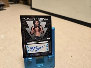 2023 Panini Chronicles UFC Brian Ortega Obsidian Lightning Strike Auto # OL-BOR - Picture 1 of 2