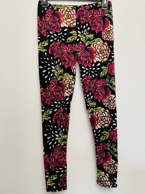 Leggings estampado floral en negro, rosa y marrón. Talla M/L Foto 1 de 4