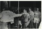 1987 Press Photo Syracuse University football fan throws drink at man after game