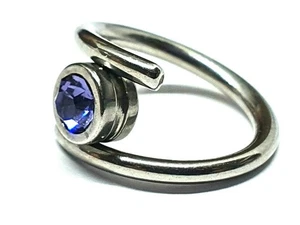 Tanzanite Twist Ring 12mm Drum Lock Acciaio 316L 14g (1.6mm) Ear Orbital... - Foto 1 di 12