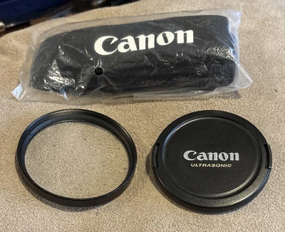 Canon E-72 72mm Front Lens Cap *NEW Black Strap OEM + Tiffen 72mm Haze-1 Filter - Image 1 of 4