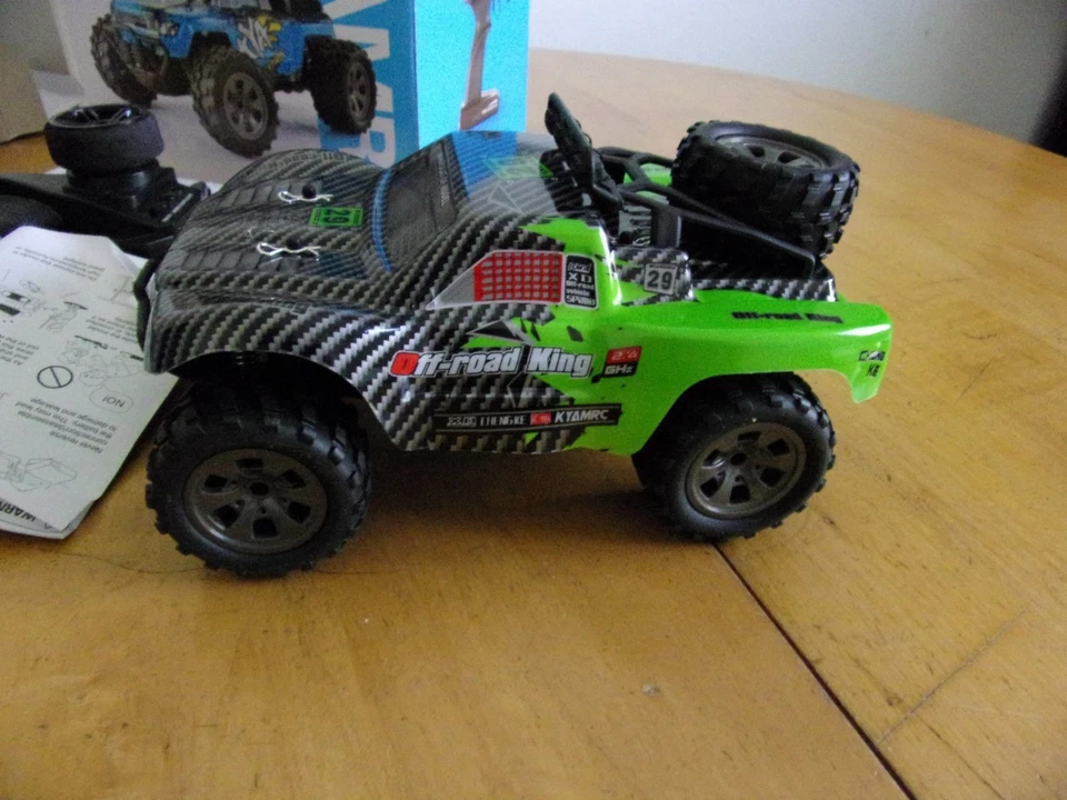 RC trucks with free dog toy - Image 1 of 1