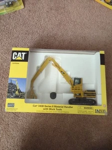 CAT 345B Series II Material Handler with Work Tools 1:50 scale - Picture 1 of 12