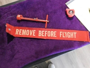 REMOVE BEFORE FLIGHT Safety Lock Pin & flag. AIRCRAFT Gulfstream 98GT1030 - Picture 1 of 4
