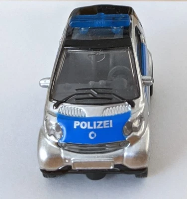 Siku 1302 Smart Fortwo Coupé Polizei Stadtflitzer -  Selten -  1067 - Bild 1 von 4