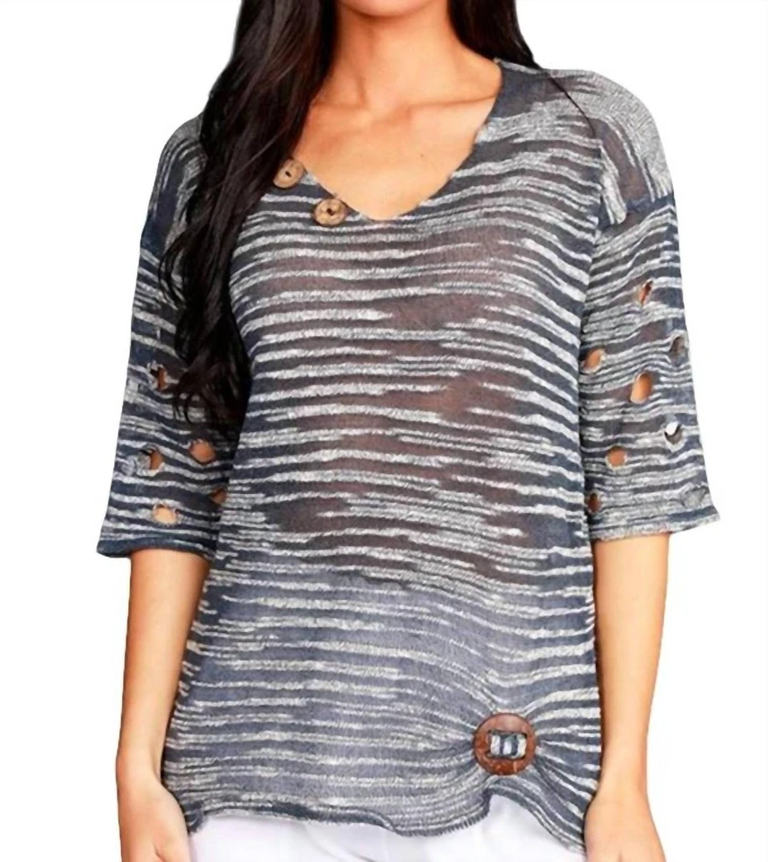 Top de mezclilla manga recortada Angel Foto 1 de 1