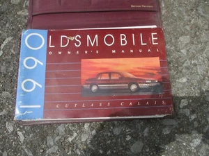 90 Olds Calais  Owner's Manual w/Case - Picture 1 of 4