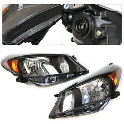 Left & Right Black Headlight Assemblies for 2012-2014 Toyota Yaris Hatchback - Image 1 of 4
