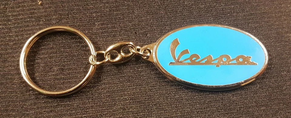 Vespa Porte-Clés Inscription Bleu Clair Émaillées Scooter - 47x29mm Foto 1 de 1