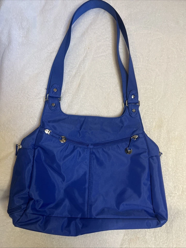 Cartera Travelon antirrobo 2014 nunca usada azul cobalto Foto 1 de 4