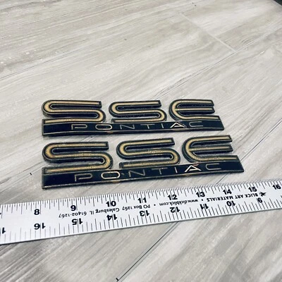 Original GM 1993-1999 00-04 Pontiac Bonneville SSE Emblem Badge Gold Black - Image 1 of 2